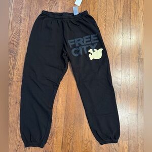 freecity Black Kids Sweatpants with cream bird Logo
Size S